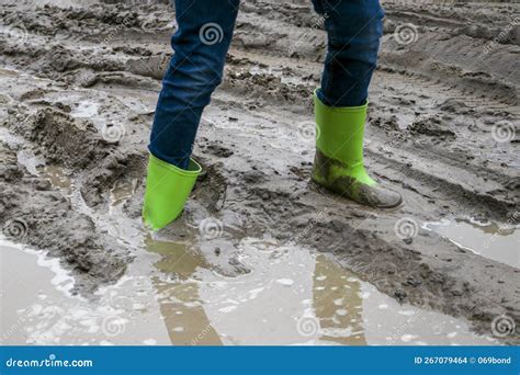 shoe mud cleaner|kids boots stuck in mud.